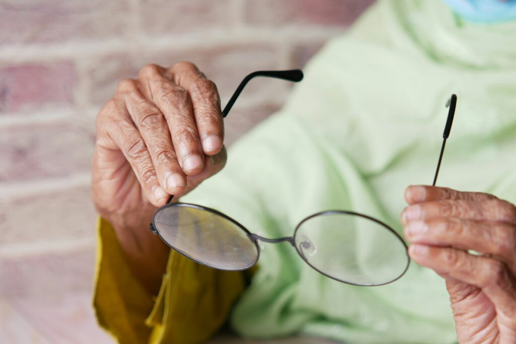 a senior in Ontario observes his out-of-date round cloudy eyeglasses and wonders if OHIP will cover his next pair of prescription eyeglasses. 